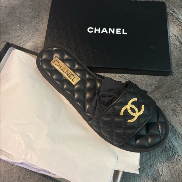CHANEL Shoes - CHANEL Black Quilted Slide with Gold CC Logo
